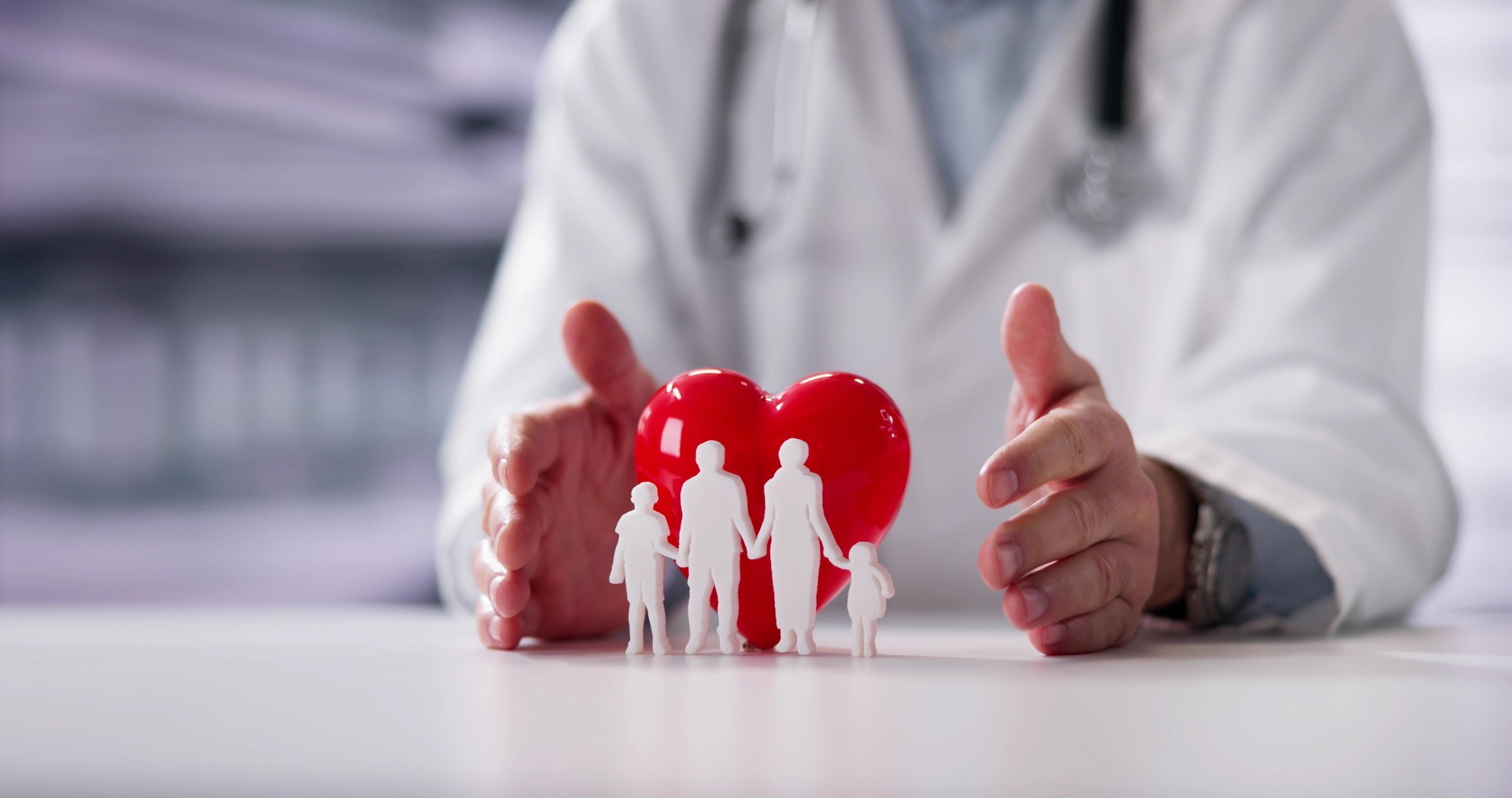 Close-up Of A Doctor's Hand Protecting Family Cut Out