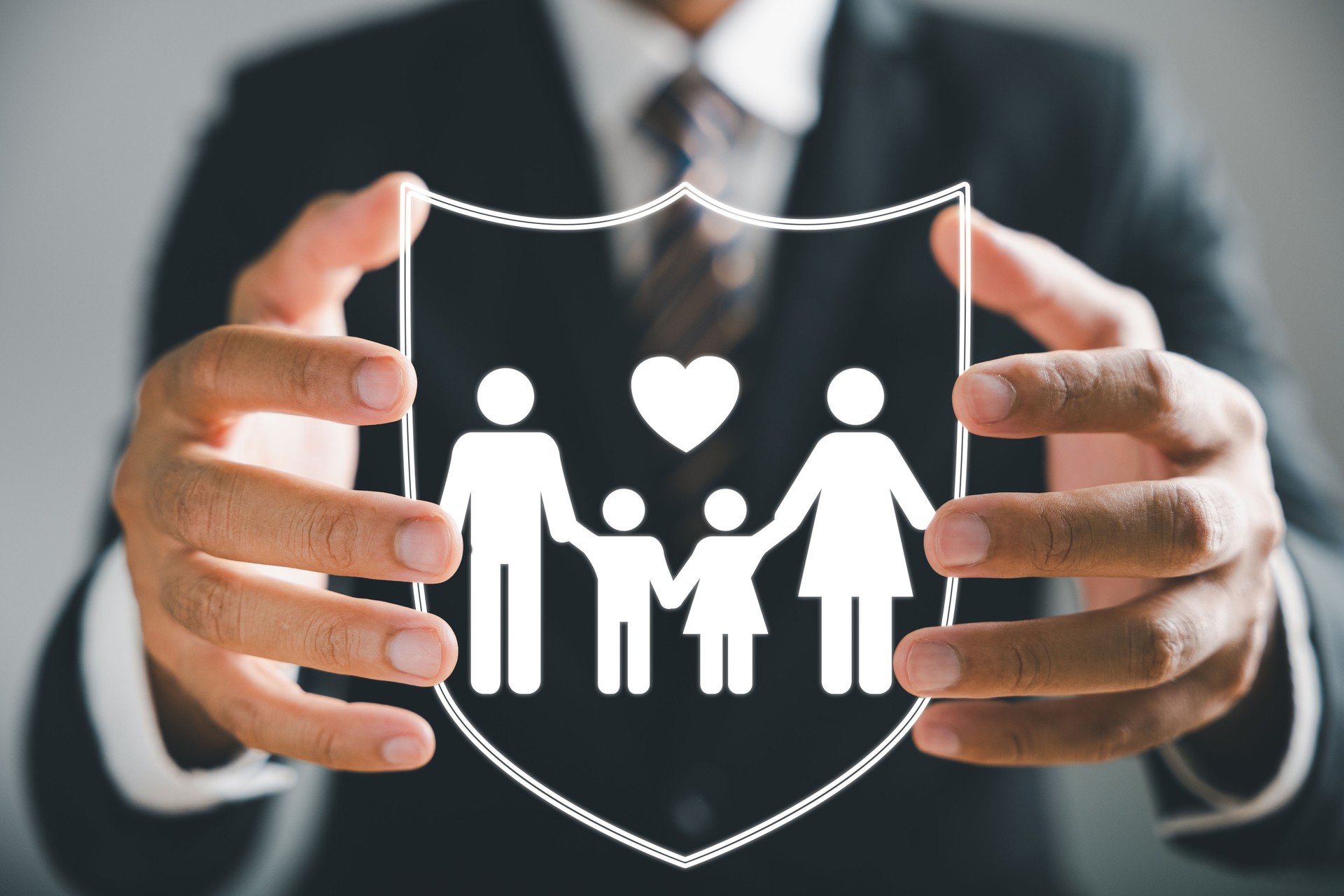 Man with protective gesture and icon of family